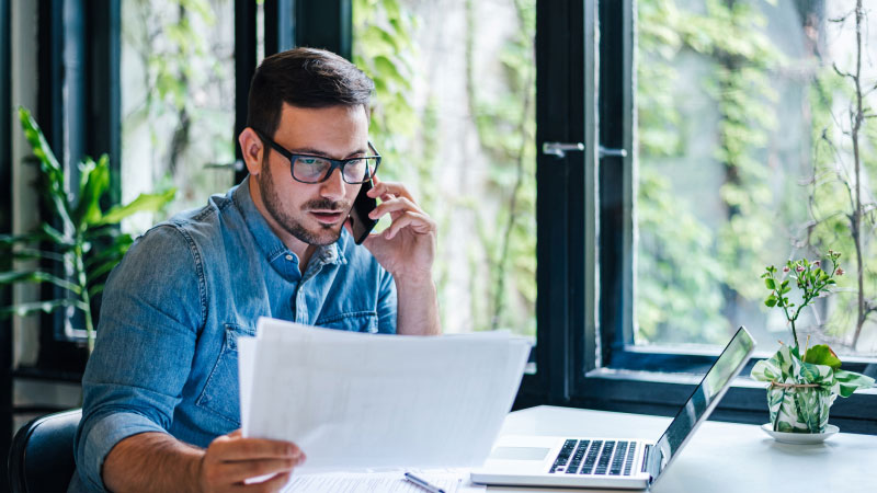 Man managing his small business finances